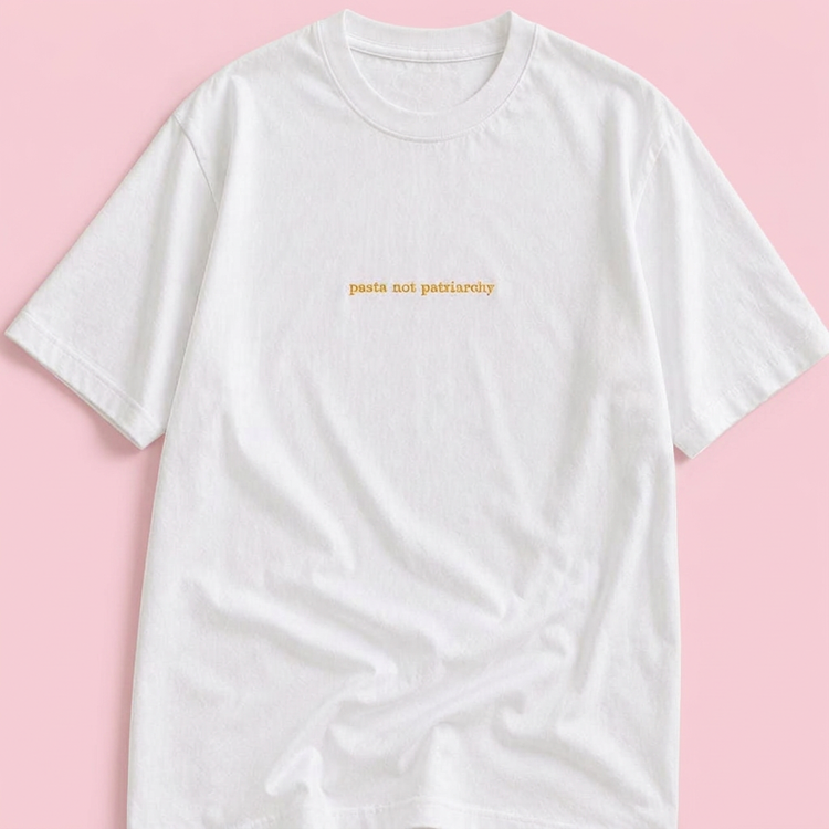 Pasta not Patriarchy embroidered white t-shirt on a blush pink background