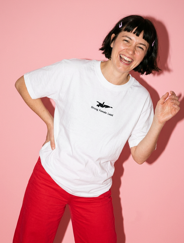 Playful model styling for the Strong Female Lead tee
